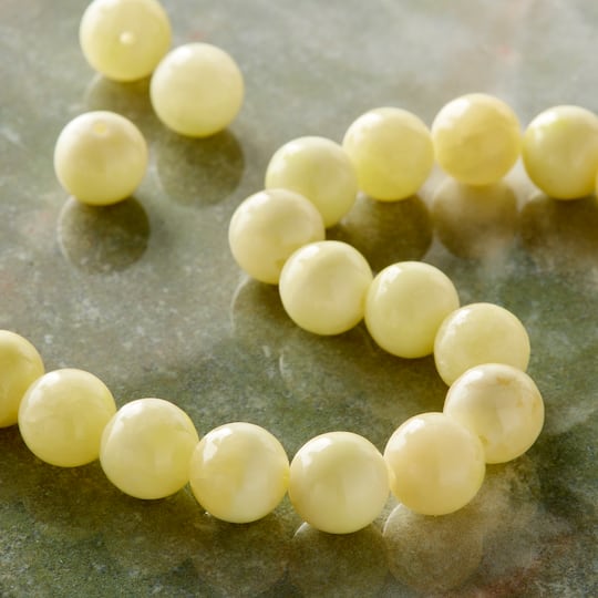12 Pack: Cream Dyed Quartzite Round Beads, 10mm by Bead Landing™